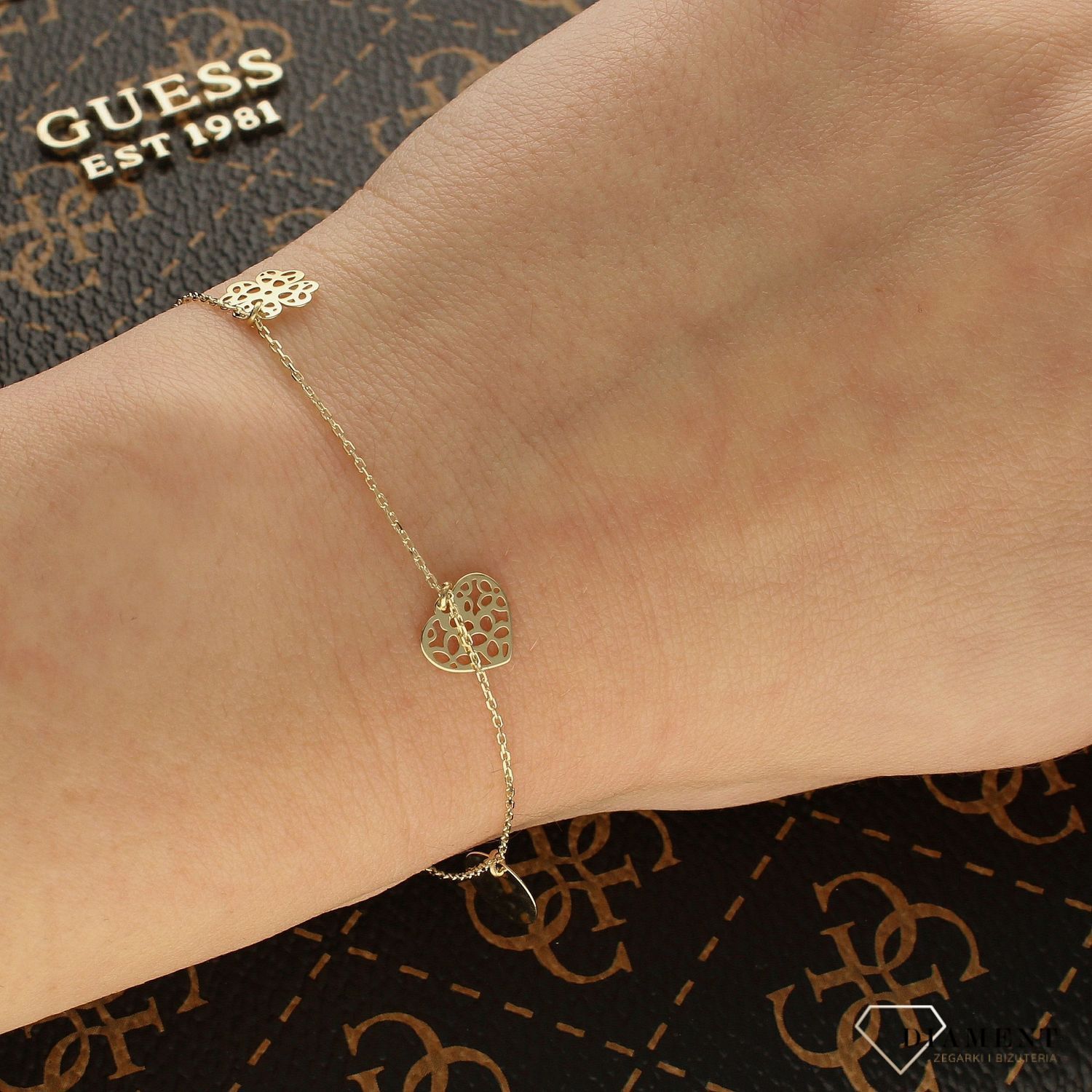 Złota bransoletka celebrytka z zawieszkami serce, koniczynka, kółko BR 5740.jpg